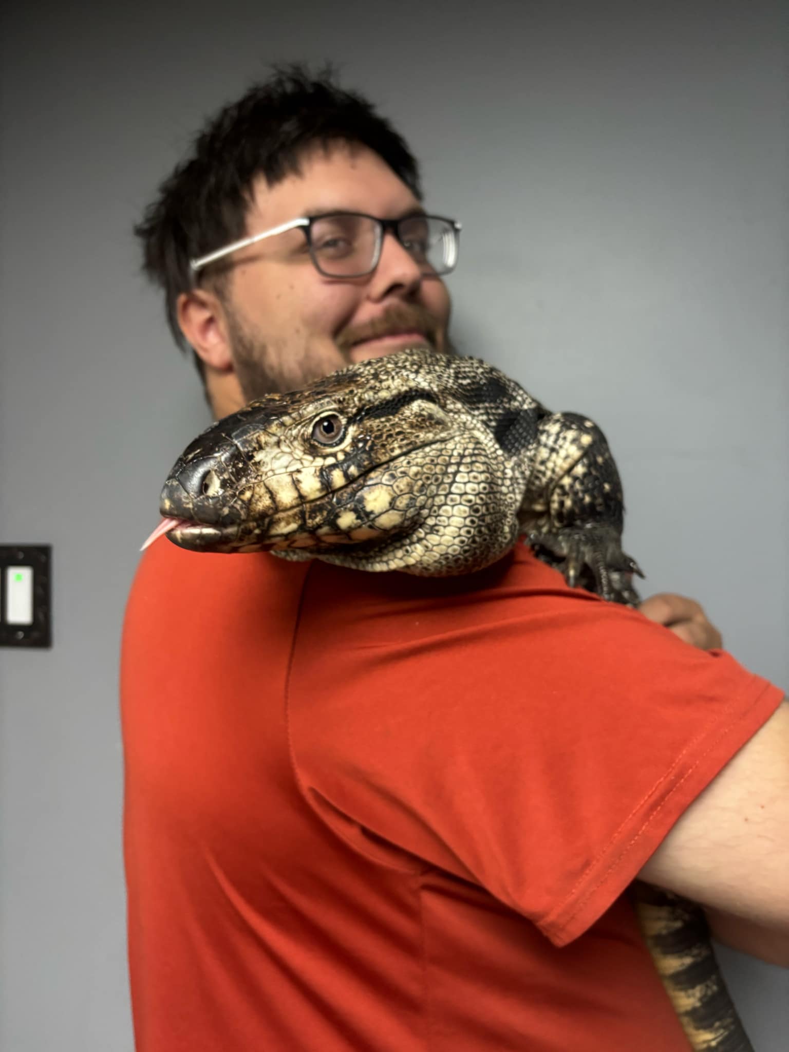 Jackson with Porangu the tegu